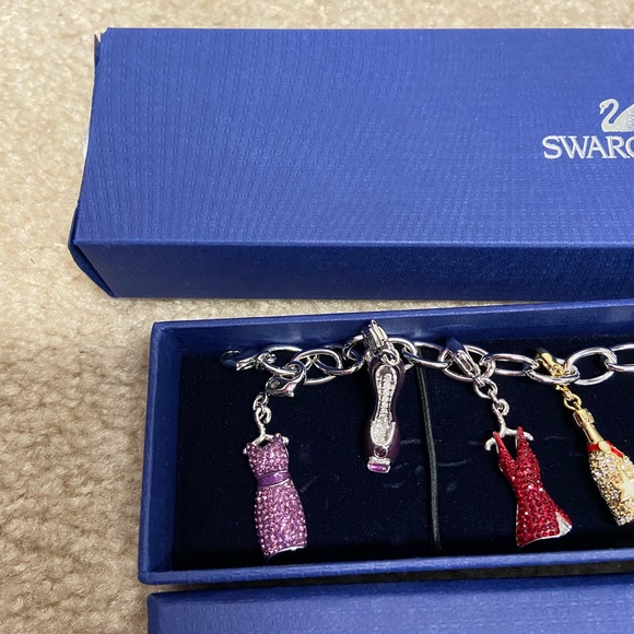 Stunning Swarovski charm bracelet. Dresses and shoes charms! Brand new - Picture 5 of 9